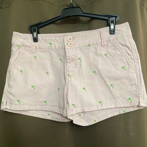 Pink shorts with palm trees